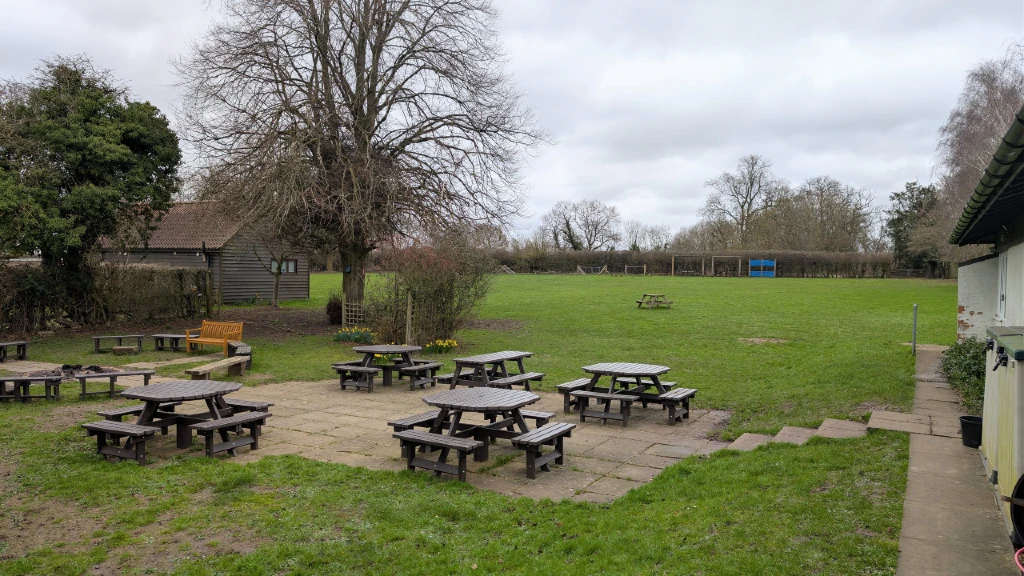 Guide Centre campsite patio and camping field